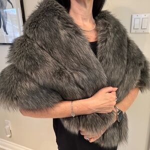 Faux fur shawl/wrap with hook and eye closure 
Grey